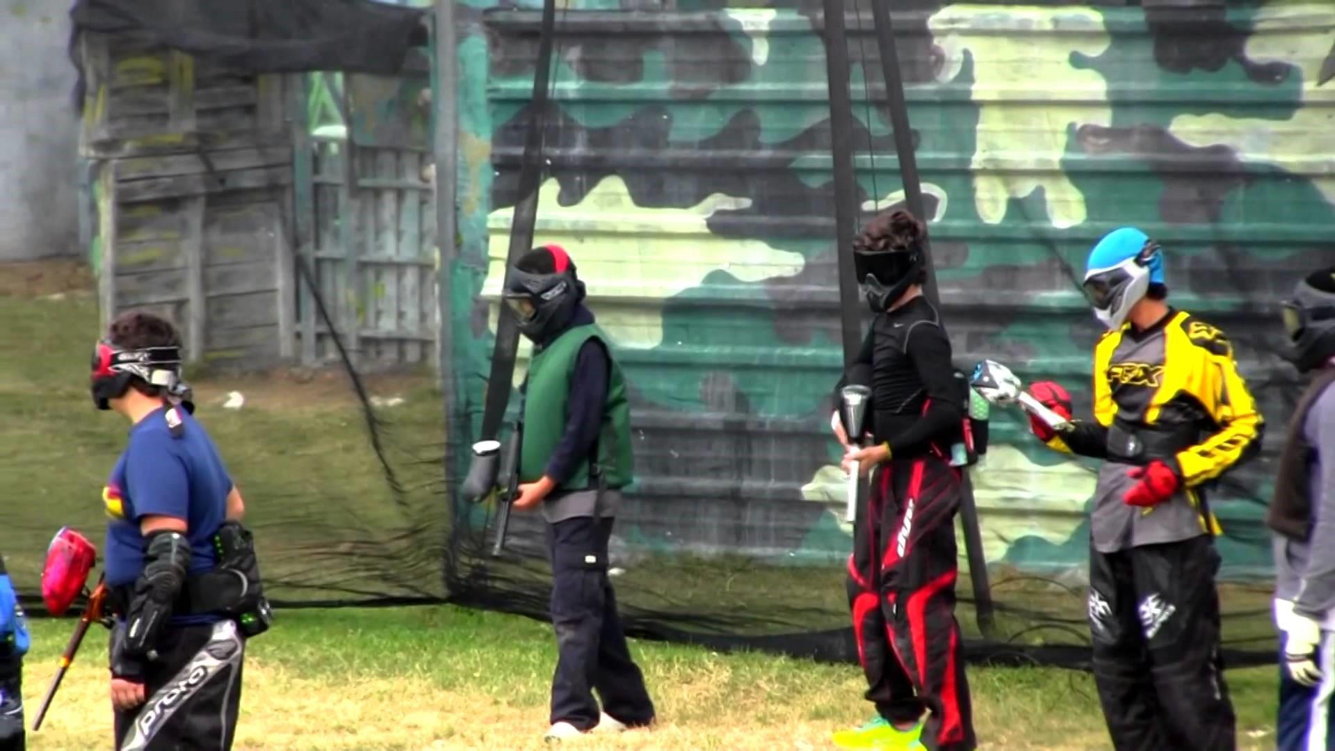 Practice paintball with team members